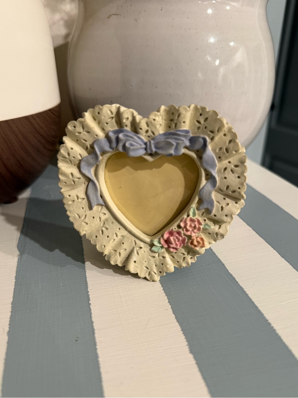 Heart-Shaped Ceramic Photo Frame in Cream with Blue Bow and Pink Flowers